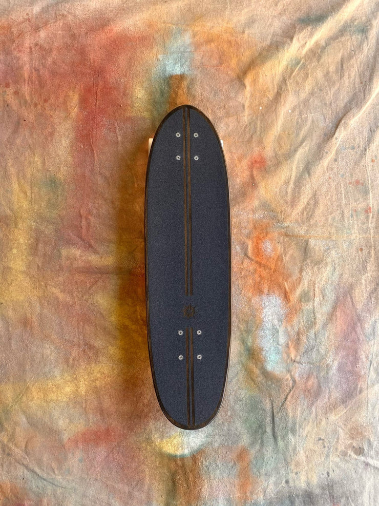 Sidewalk Surfer Stained w/ Grip Tape